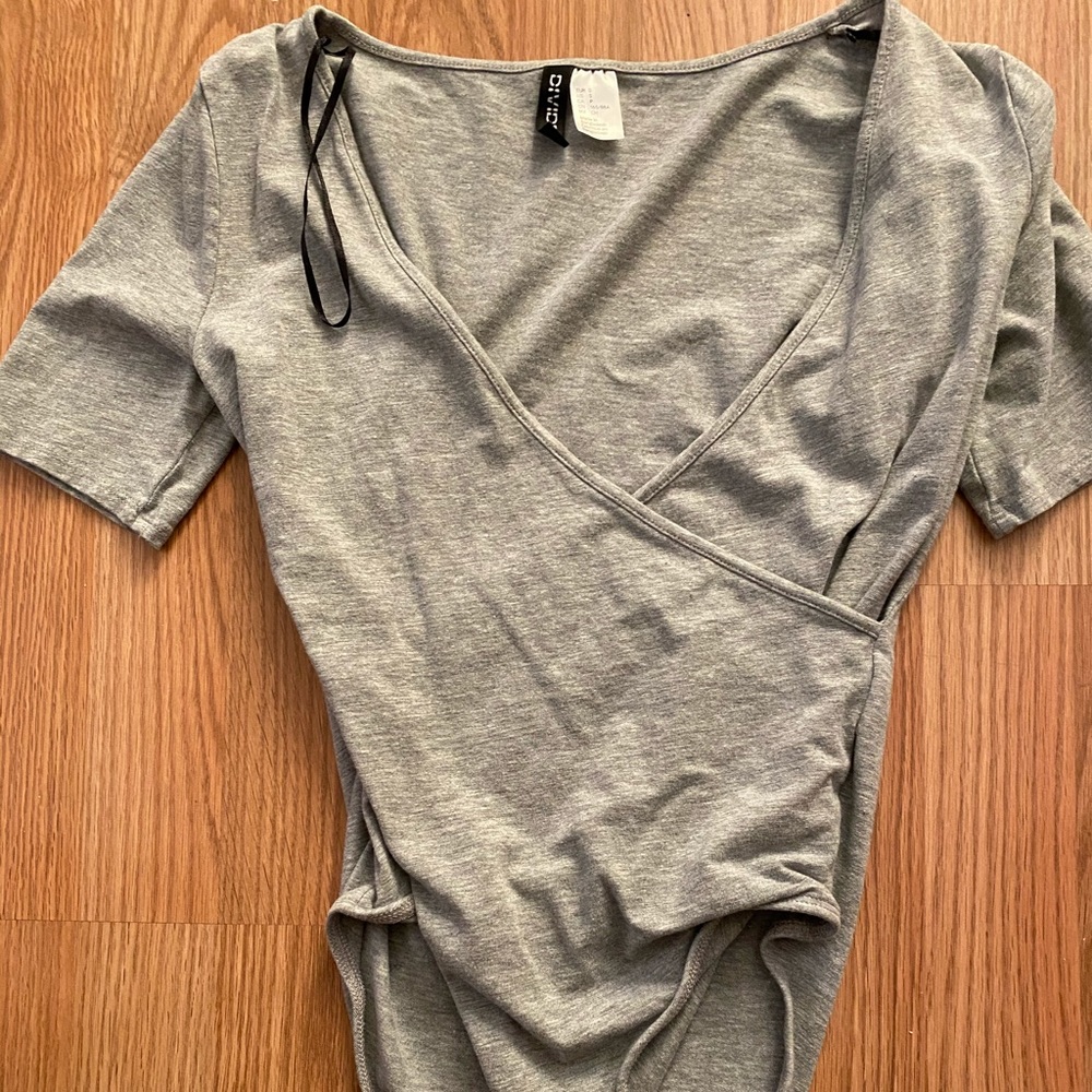 Grey body suit
